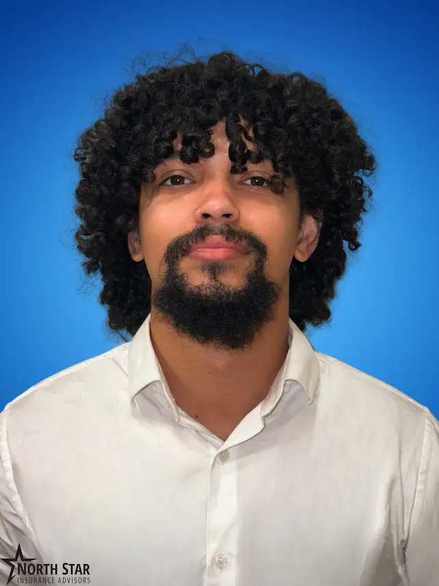 Zavion Blair, licensed Medicare agent, professional headshot on light background